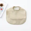 Waterproof PU Baby Bibs with Catch-All Pocket Soft Feeding Apron for Infants Toddlers - Beige Solid