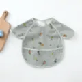 Waterproof baby bib with cute fruit print, soft PU smock for toddler mealtime feeding details. - Petal-Style PU Bibs - Green Fruit