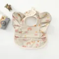 Waterproof baby bib with cute angel wings and rainbow cloud print, ideal for toddler feeding. - Rainbow Wings Style