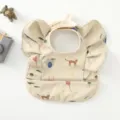 Korean style baby PU waterproof bib with cute angel wings and animal prints for feeding. - Beige Zoo Wings Style