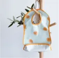 Baby waterproof feeding bib detail, cute animal print with orange trim and handy pocket. - Blue Lion