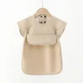 Detailed view of waterproof baby PU short-sleeve feeding smock bib featuring front pocket. - S / Light Coffee