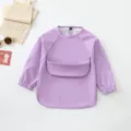 Waterproof baby long-sleeve smock bib in purple, perfect for messy meals and art play. - Size S for 6-12 Months / Purple