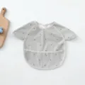 Grey polka dot baby PU waterproof smock bib with short sleeves and crumb catcher pocket. - Petal Style PU Bib - Grey Polka Dots
