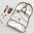 Cute waterproof baby bib with adorable bear pattern, lightweight and easy to clean for toddlers. - Teddy Bear