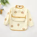 Detailed view of the waterproof baby long sleeve smock bib with cute tiger print and food catcher pocket. - Size L (24-36 Months) / PU Top Pocket Tiger Head Bib