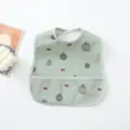 Waterproof baby bib with cute pumpkin print, soft pocket catcher for easy feeding time. - Green Pumpkin