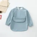 Waterproof baby long sleeve smock bib with pocket, breathable infant feeding coverall. - Size S for 6-12 Months / Blue