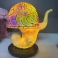 Bunte Schnecken-Tischlampe im europäischen Landhausstil für ästhetische Schreibtischdeko - Bunte Schneckenlampe