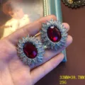 Pendientes de botón piedra roja sol vintage elegante joya diamantes imitación accesorio. - Pendientes de botón de circonita roja
