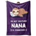 Cozy purple flannel blanket featuring a cute sleeping sloth print and fun text, perfect for home. - Style 9