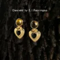 Vintage gold dangle earrings featuring natural tiger eye stone and black heart pendants for women. - Tiger Eye Stud Earrings