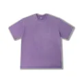 Close-up detail of vintage acid wash purple t-shirt, casual loose short sleeve top. - Purple