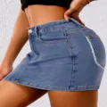 Close-up of women's blue denim mini skirt detail, stretchy fabric and pocket design. - S / Light Blue