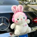 Simpatico ciondolo per auto in peluche di coniglio, bambola soffice con cuffie rosa per baule. - Coniglio