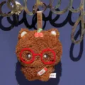 Cute cartoon brown bear plush keychain, soft stuffed animal doll with red glasses for gifts. - Glasses Bear