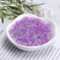 Close-up detail of mixed size transparent bubble beads in heart dish for DIY crafts decor - 20g Pack / Deep Purple Series