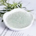 Close-up of transparent iridescent bubble beads in a white dish, craft DIY decoration. - 20g Pack / Clear White