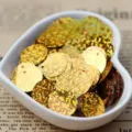 Detail view of 15mm gold laser sequins with hole for DIY crafts and apparel decoration. - Laser-Gold