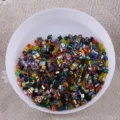 Colorful mixed bugle beads and seed beads close-up detail for DIY handmade jewelry bracelets. - 2mm Silver-Lined Bugle Beads - 20g