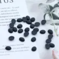 Ojos de seguridad ovalados negros de plastico plano para munecas DIY hechas a mano y peluches. - 6x8mm 100 Piezas/Paquete / Negro