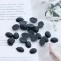 Ojos de seguridad ovalados negros para muñecos de ganchillo DIY, ojos planos de plástico artesanales. - 9x12mm 50 Piezas/Paquete / Negro