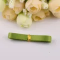 Green double-faced satin ribbon variant for DIY crafts, bowknots, and gift wrapping decoration. - Army Green