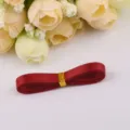Dark red double-sided satin ribbon for DIY crafts, gift wrapping, and bow making. - Burgundy