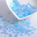 Blue iridescent butterfly nail art glitter sequins for DIY crafts and nail decor. - Butterfly / 6mm / Transparent Blue