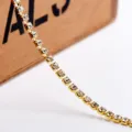 Catena di strass dorati da 3mm per creazione di gioielli DIY e accessori artigianali - Confezione da 1 Metro / Oro