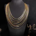 Multi-strand gold layered necklace detail, stylish metallic chain design for women fashion jewelry. - 45cm