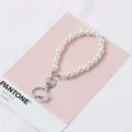 Leuke parel telefoonkoord strap met schattige hart metaal sluiting sleutelhanger design - Parelhanger / Zilver Hart