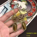 Vintage brass long drop earrings featuring brown natural stone and carved floral design for women. - FM1406 Tiger Eye Stud Earrings