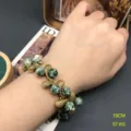 Vintage green speckled bead bracelet with textured metal charms and crystal accents for women. - FM1433 Qinghai Jade Bracelets