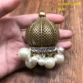 Close-up detail of vintage ornate domed pearl brooch pendant showing intricate craftsmanship. - HE710 Pearl Brooch