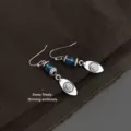 Vintage blue beaded dangle earrings with spiral sun charms, retro bohemian style drop earrings. - Retro Leaf Tassel Style (7513) / Antique Silver