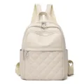 Sac à dos matelassé beige pour femme, élégant sac de voyage et d'école décontracté avec zips. - Blanc Cassé