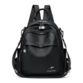 Sac à dos noir en cuir souple pour femme, sac de voyage décontracté avec plusieurs poches. - Noir