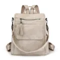 Sac à dos femme décontracté beige avec poche zippée à franges, style multifonctionnel quotidien. - Blanc Cassé