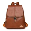 Sac à dos rétro en cuir PU pour femme avec pendentif chat mignon et grande capacité. - Marron