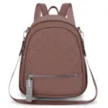 Stylish women's backpack in dusty rose with embossed geometric pattern and chic rhinestone zipper. - Pink