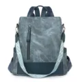 Women's grey-blue soft leather casual backpack with geometric strap and front zip pocket. - Blue