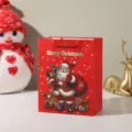 Christmas gift paper bag with cute Santa Claus design, festive candy and present packaging. - Style 1 (696-1) / 18x10x23cm