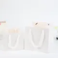 Sacs cadeaux carres en papier blanc avec anses en ruban pour gateaux et emballage floral. - 10*10*10 / Blanc