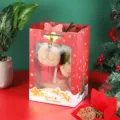 Christmas gift paper bag with transparent window and cute plush reindeer toy for holiday wrapping. - Hot Stamping 14x8x18cm / Red Bell