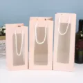 Sacchetti regalo in carta rosa con finestra trasparente, manici eleganti per fiori e confezioni. - Rosa chiaro