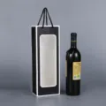 Sac cadeau pour une bouteille de vin noir et blanc avec fenêtre transparente. - Noir avec cadre blanc