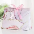 Pink marble gift bag with pink ribbon bow and silver handles, main view product presentation - Light Purple Gold-Small (18x10x16cm)