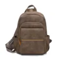 Sac à dos vintage en cuir PU pour femme, sac de voyage décontracté avec fermeture éclair. - Marron