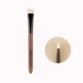 Professional angled eyebrow brush with natural hair, wooden handle for precise makeup. - Walnut Wood Wild Brow Brush (White Raccoon Hair)